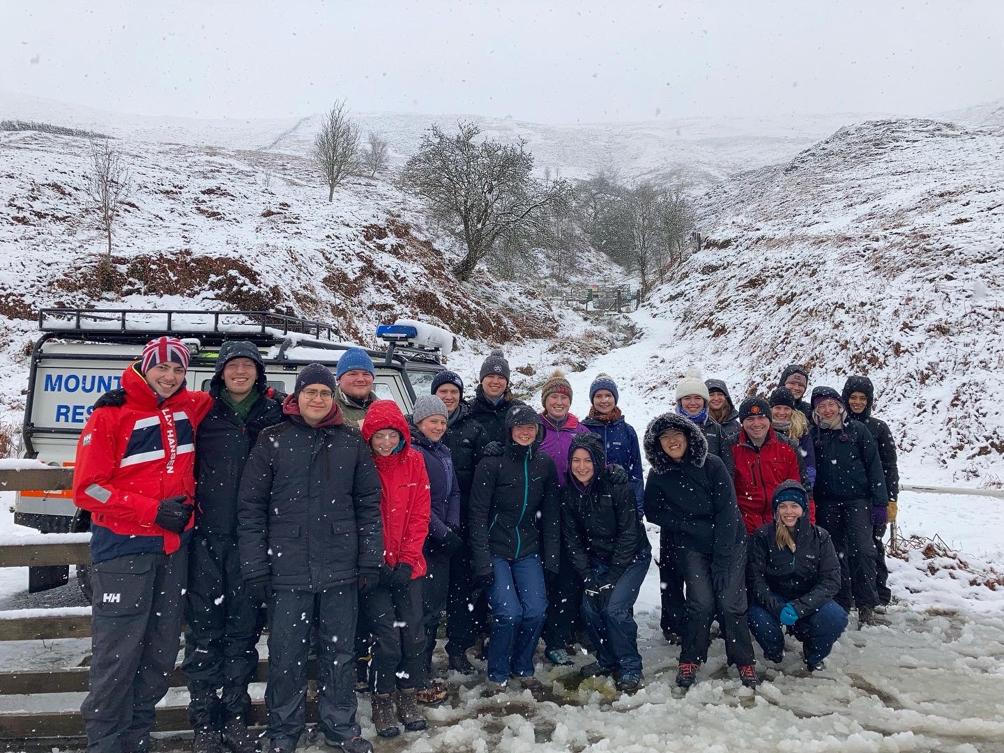 LSCFR group photo in snowy mountains during Mountain Rescue residential trip